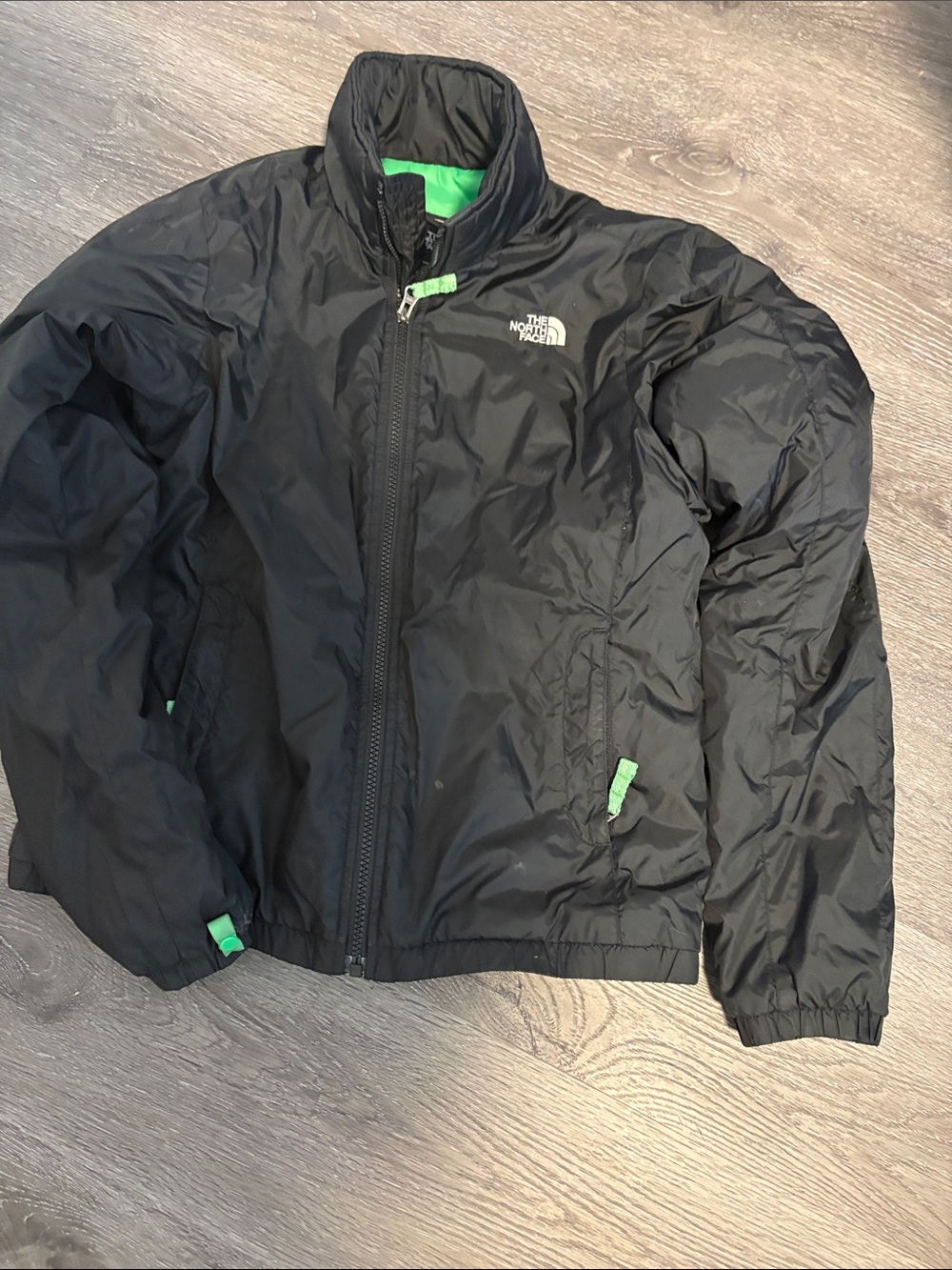 The North Face Black Puffer Jacket with Green Trim - woman